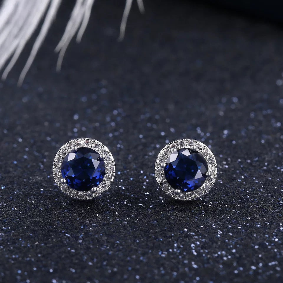 Halo Stud Earrings in Blue Round Cut Cubic Zirconia