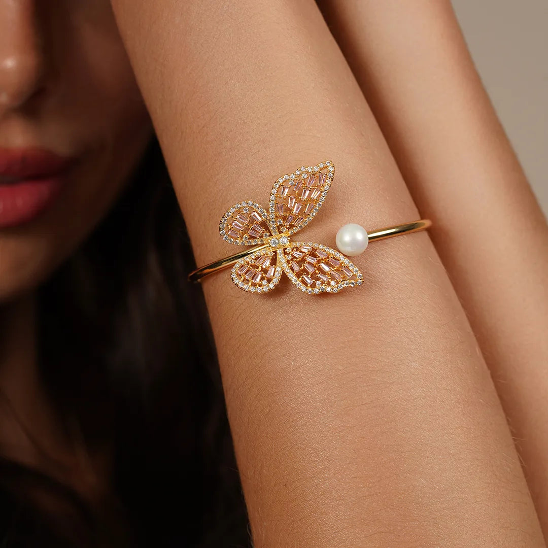 Butterfly Pearl Open Cuff Bracelet worn on a model's wrist