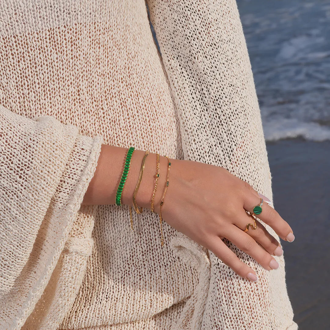 Herringbone Chain Bracelet in Gold Vermil 3 mm worn on a model's wrist, alternate pose