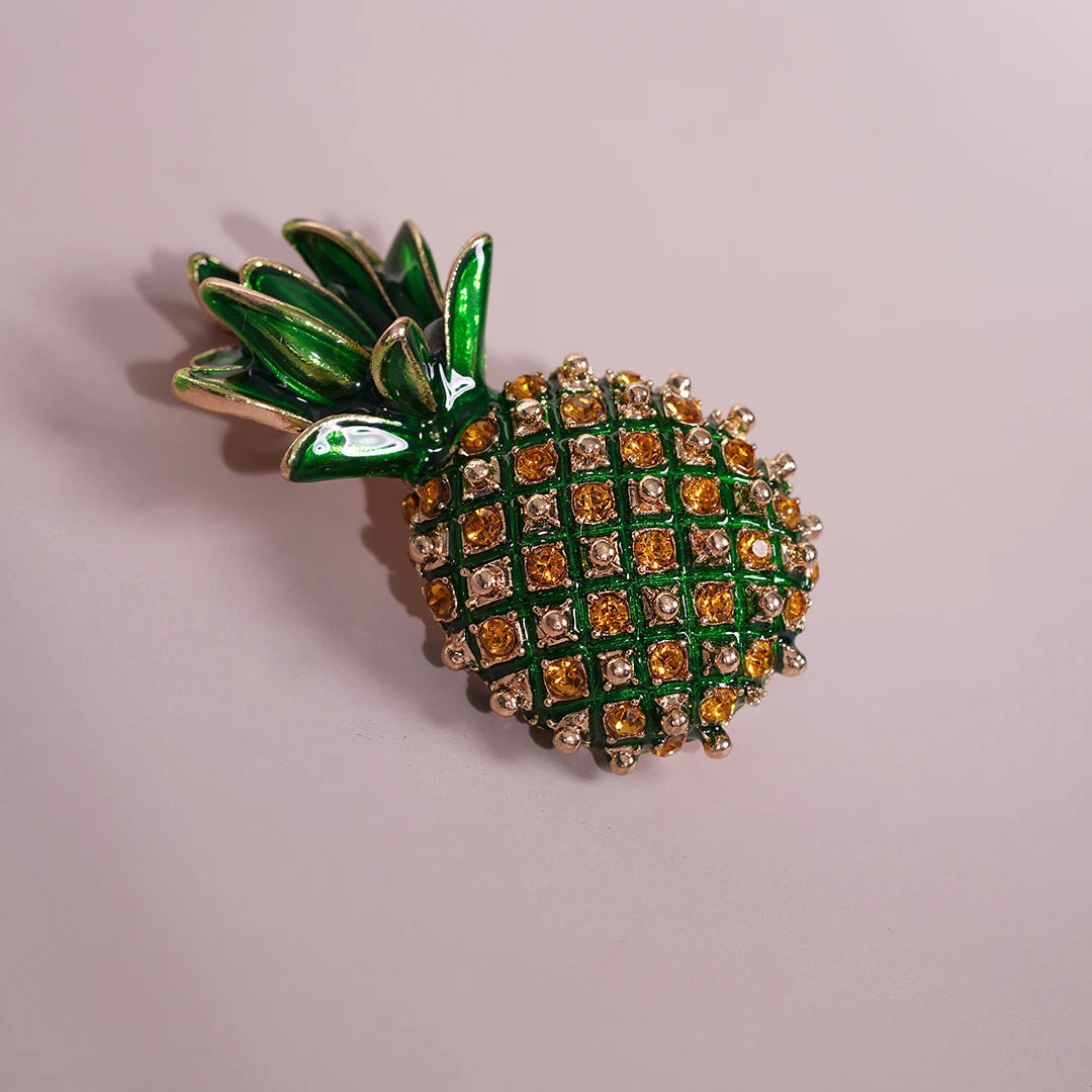 Crystal Pineapple Brooch Pin styled on a soft-toned background