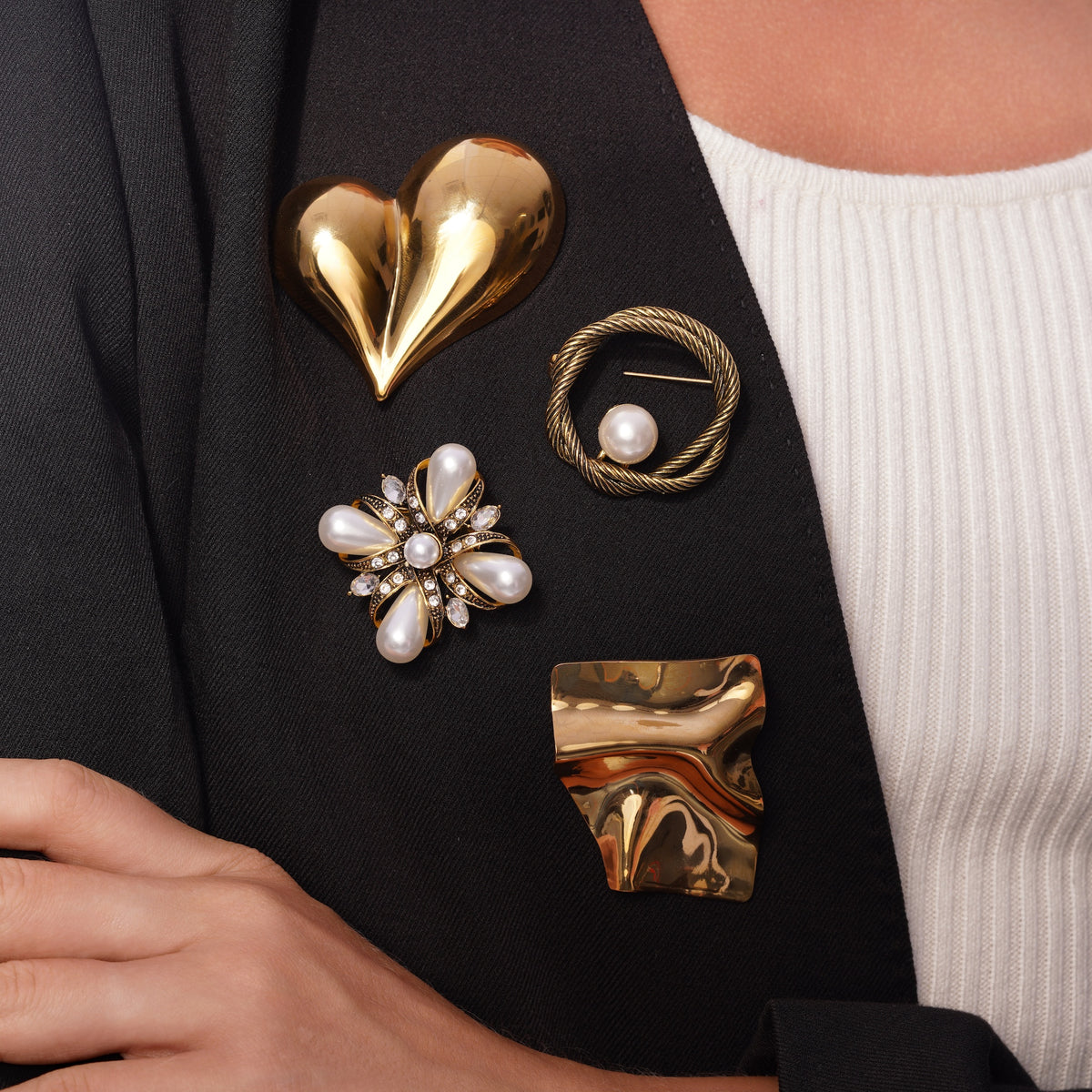 Model wearing Zard Jewelry brooches, alternate pose