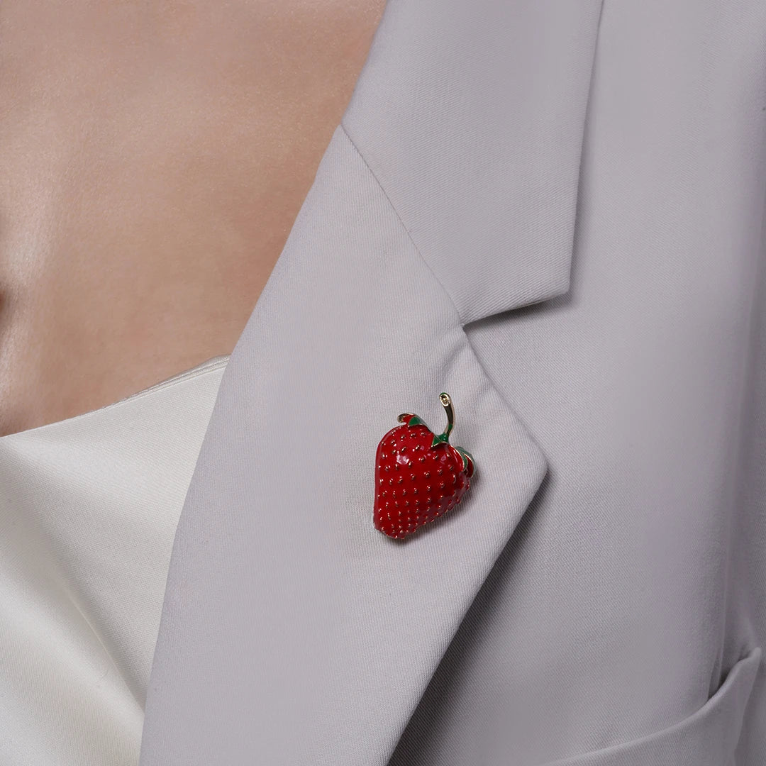 Strawberry Enamel Brooch Pin pinned to a model's outfit