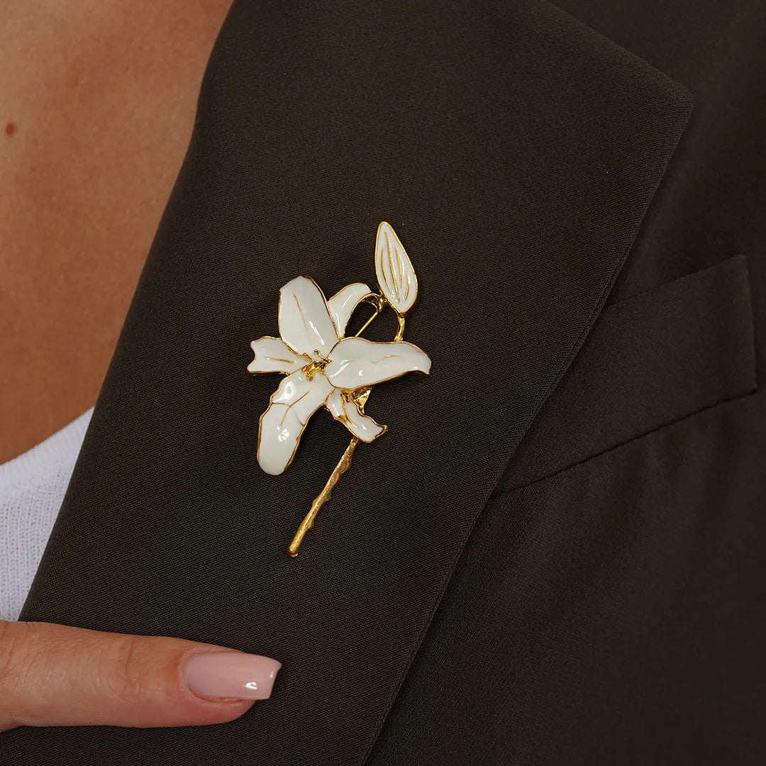 White Lily Flower Enamel Lapel Brooch pinned to a model's outfit