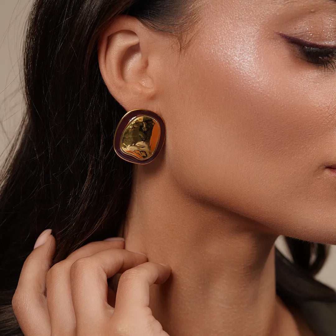 Model wearing Chunky Oval Stud Earrings in Enamel Accent