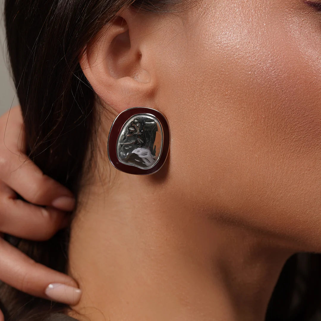 Model wearing Chunky Oval Stud Earrings in Enamel Accent, styled look