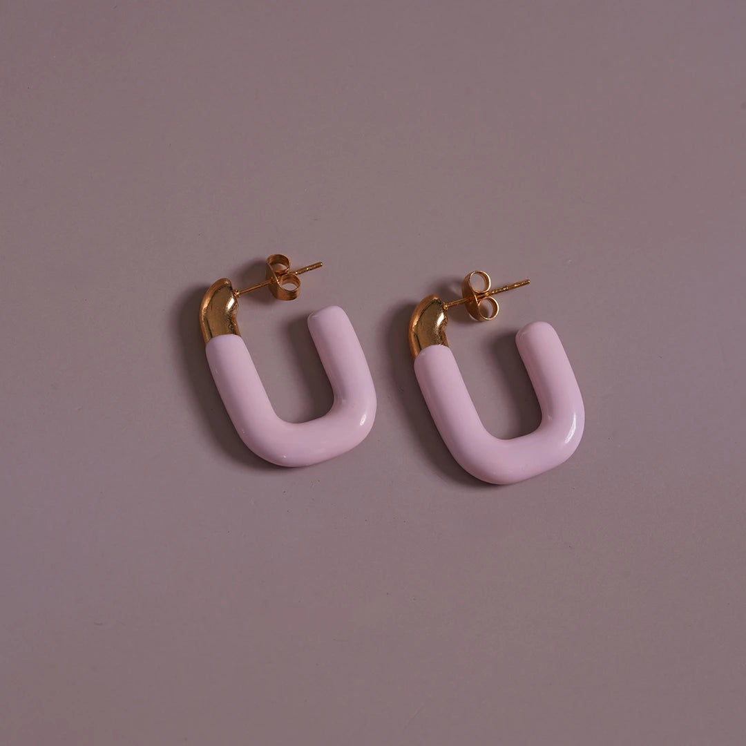Large Enamel Oval Hoop Earrings, lilac styled on a soft-toned background