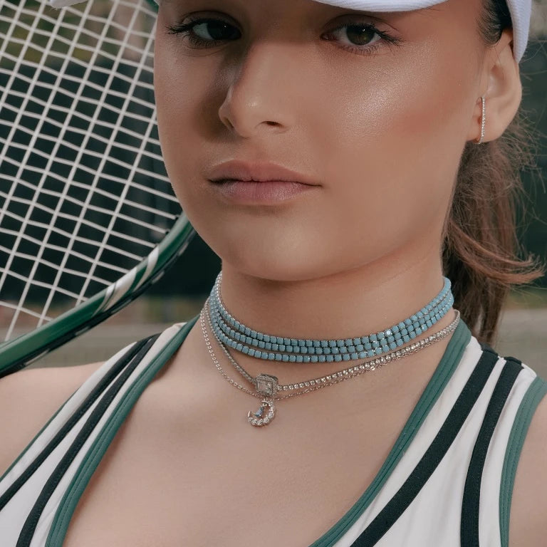Model wearing Turquoise Tennis Choker Necklace in Gold and Silver around her neck, alternate pose