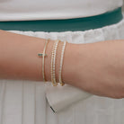 Baguette CZ Open Cuff Bracelet worn on a model's wrist, alternate pose