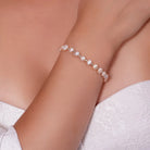 Zard Jewelry Baroque Pearl Beaded Pull-Through Bolo Bracelet worn on a model's wrist
