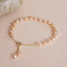 Baroque Pearl Beaded Pull-Through Bolo Bracelet styled on a soft-toned background