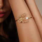 Butterfly Pearl Open Cuff Bracelet worn on a model's wrist