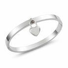 Dangling Chunky Heart Charm Bracelet in Silver, close-up detail view