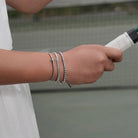 Zard Jewelry Eternity Tennis Bracelet in Classic 4 Prong 7” and 8” worn on a model's wrist
