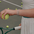 Eternity Tennis Bracelet in Classic 4 Prong 7” and 8” worn on a model's wrist, alternate pose