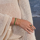 Herringbone Chain Bracelet in Gold Vermil 3 mm worn on a model's wrist, alternate pose