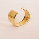 Modern Asymmetrical Open Cuff Bracelet styled on a soft-toned background