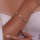 Multi-Color Freshwater Pearl Station Bracelet in 925 Sterling Silver worn on a model's wrist