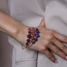Zard Jewelry Rose Quartz Beaded Gold Open Wire Bracelet worn on a model's wrist