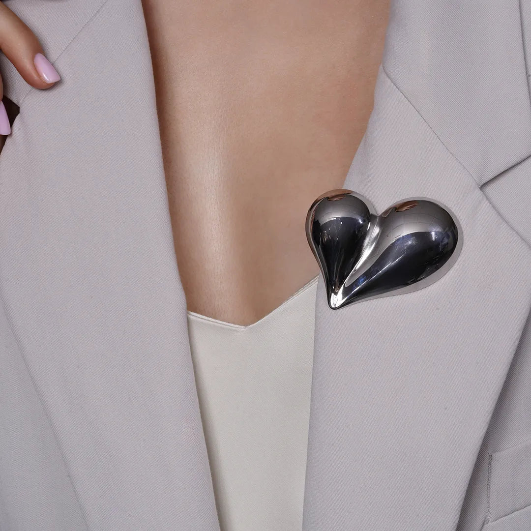 Chunky Puffy Heart Brooch Statement Pin pinned to a model's outfit