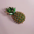 Crystal Pineapple Brooch Pin styled on a soft-toned background