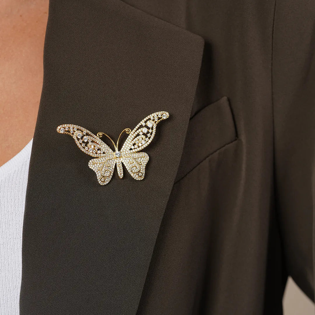 CZ Butterfly Statement Brooch Pin pinned to a model's outfit