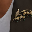 Lily of the Valley Flower Brooch with Cubic Zirconia Accents pinned to a model's outfit