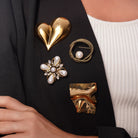 Model wearing Zard Jewelry brooches, alternate pose