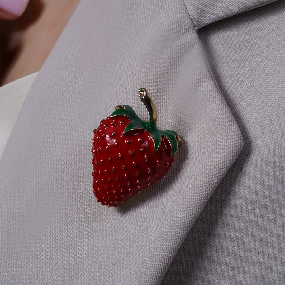 Strawberry Enamel Brooch Pin pinned to a model's outfit, alternate pose