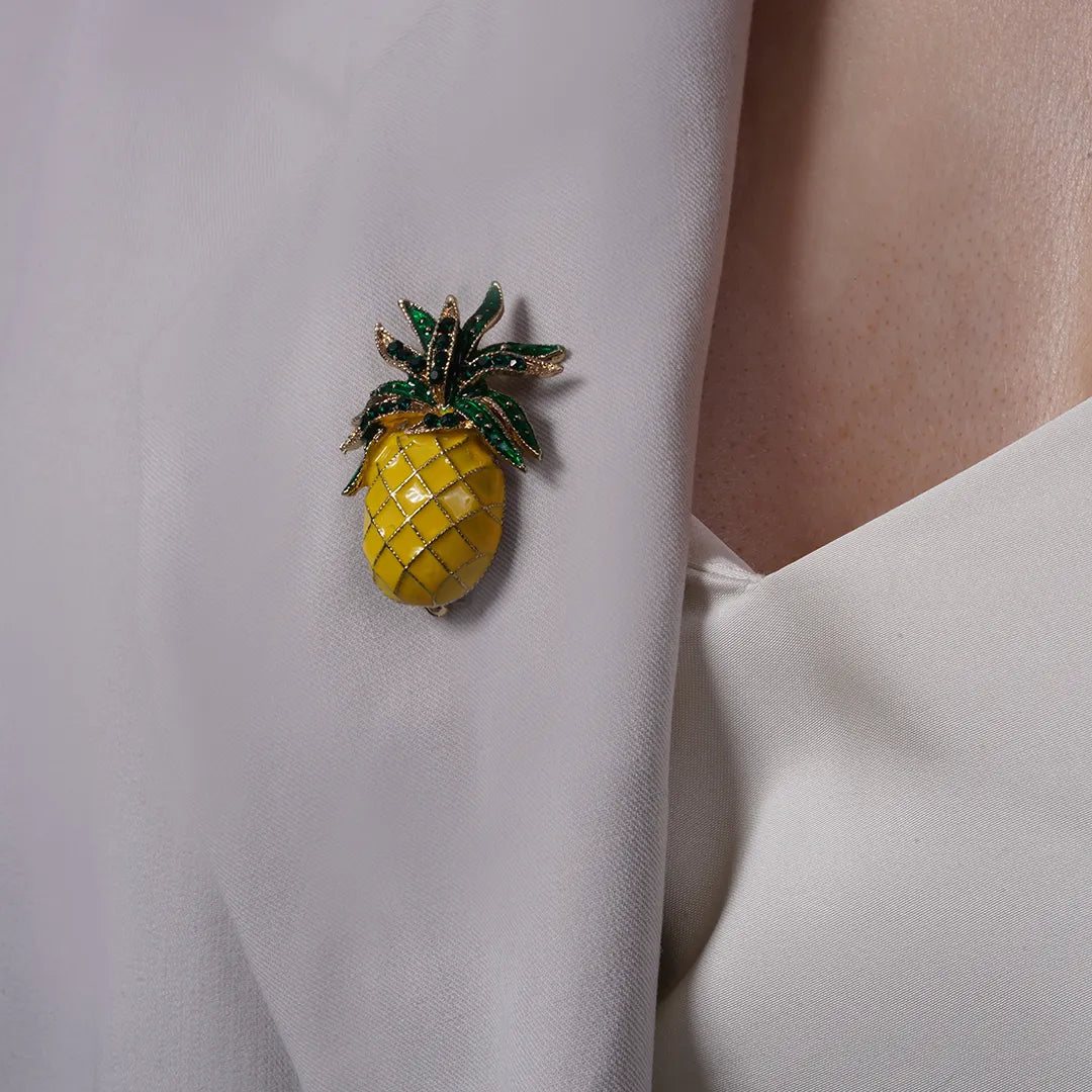 Yellow Enamel Pineapple Brooch pinned to a model's outfit, alternate pose