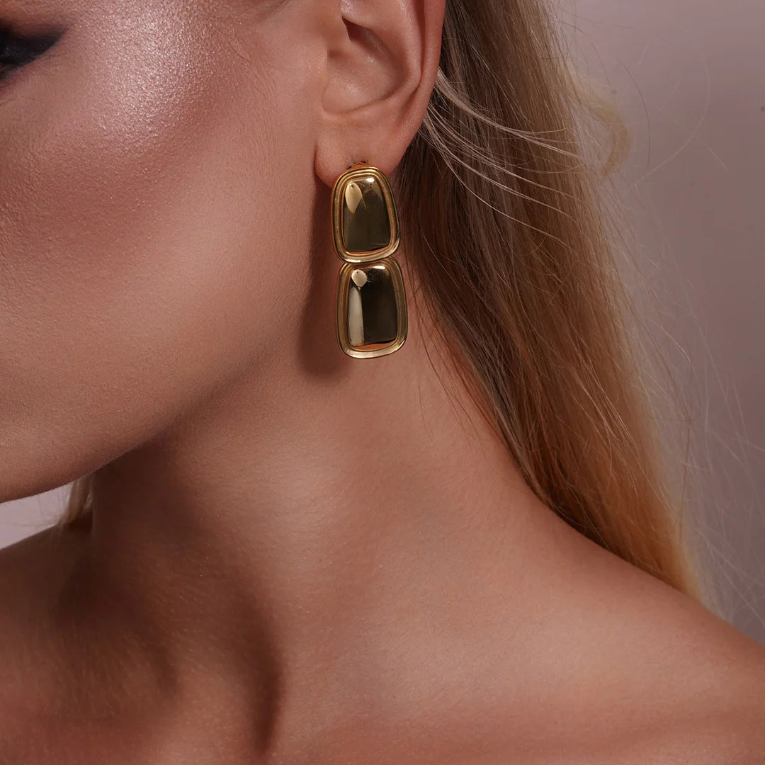 Model wearing Double Rectangle Drop Earrings, alternate pose