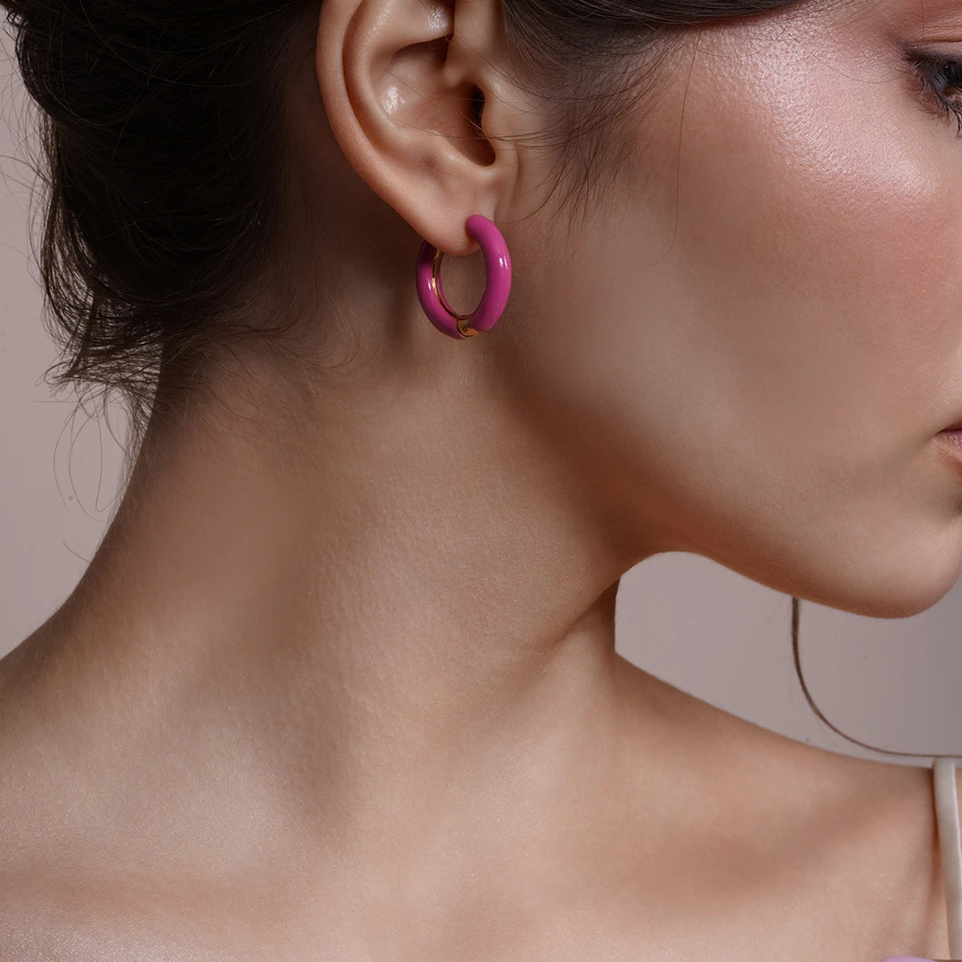 Model wearing Enamel Hoop Earrings, alternate pose