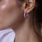 Model wearing Enamel Hoop Earrings, styled look