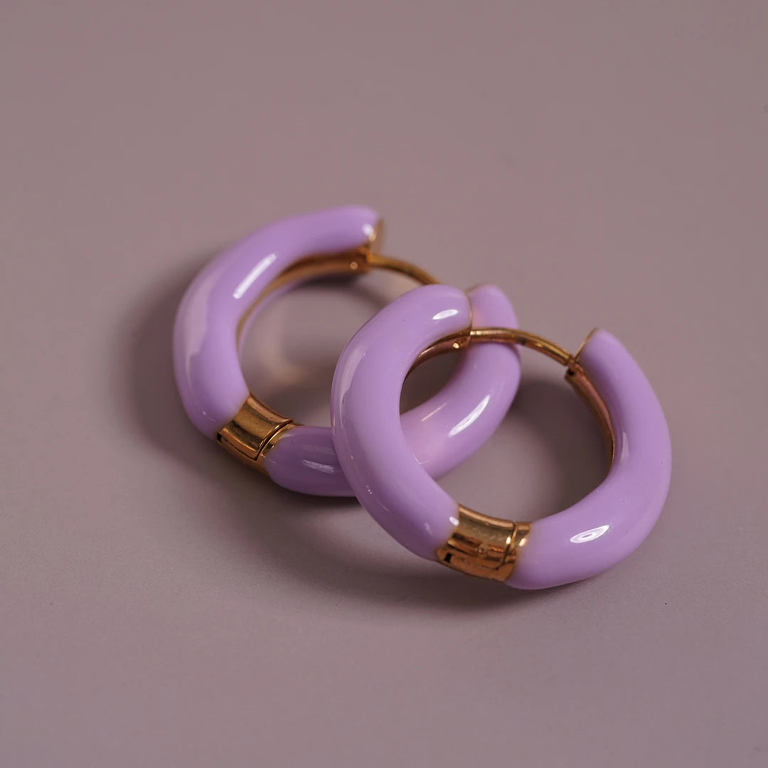 Enamel Hoop Earrings, lilac styled on a soft-toned background