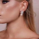 Model wearing Zard Jewelry Flower Petals Cubic Zirconia and Pearl Earrings