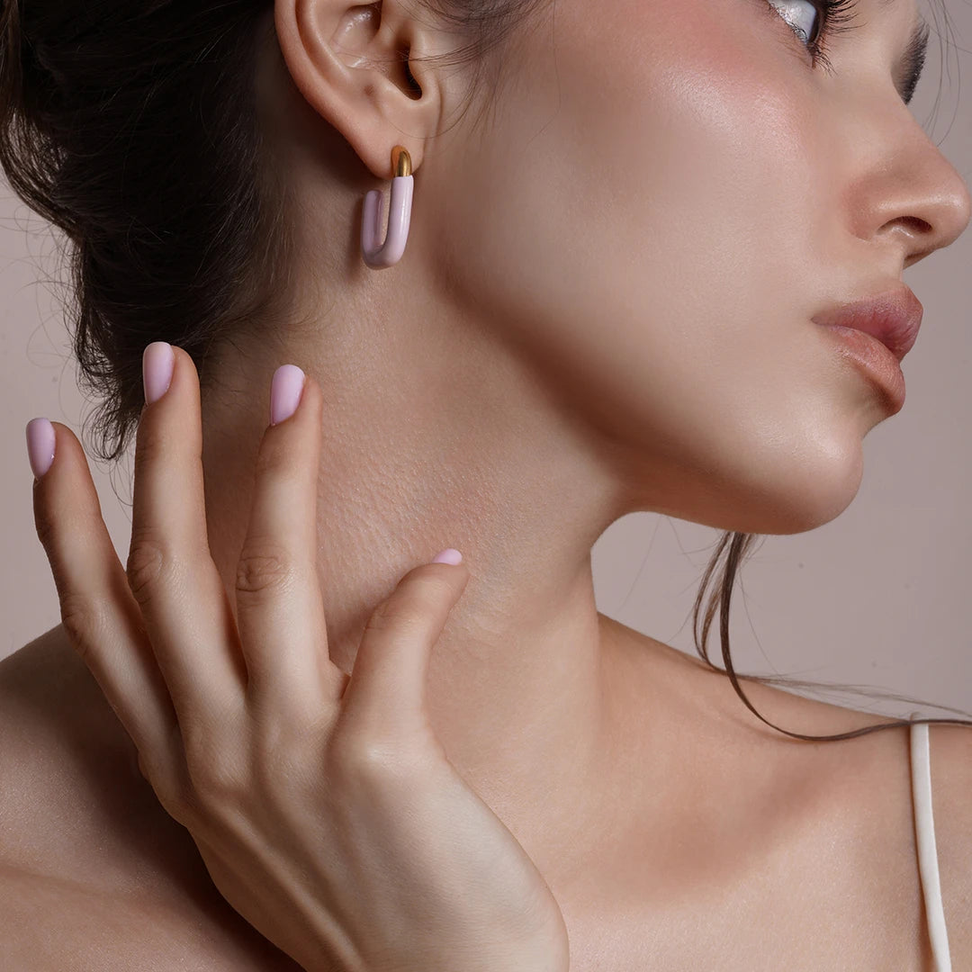 Model wearing Large Enamel Oval Hoop Earrings, second styled look