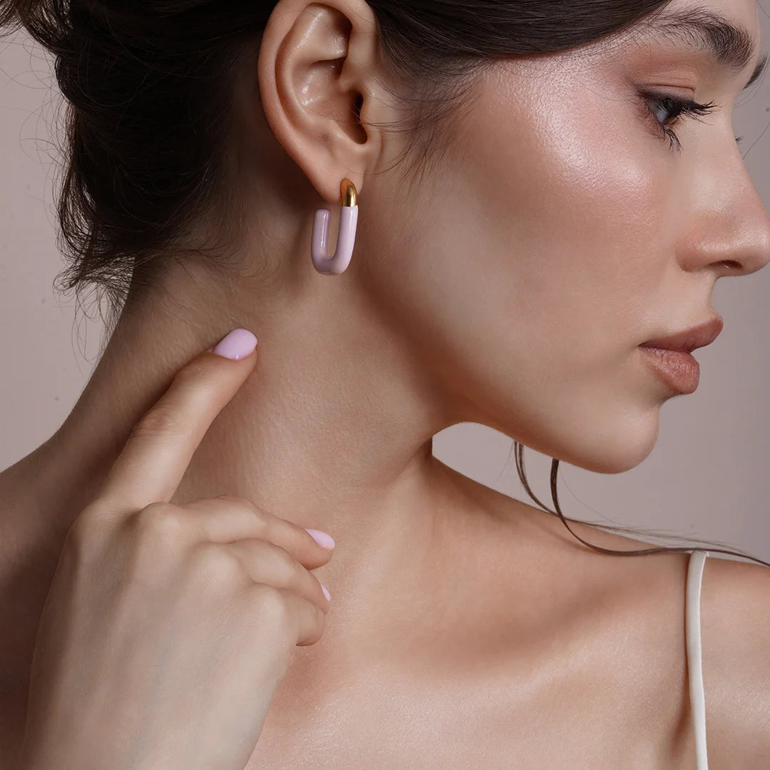Model wearing Large Enamel Oval Hoop Earrings, third styled look