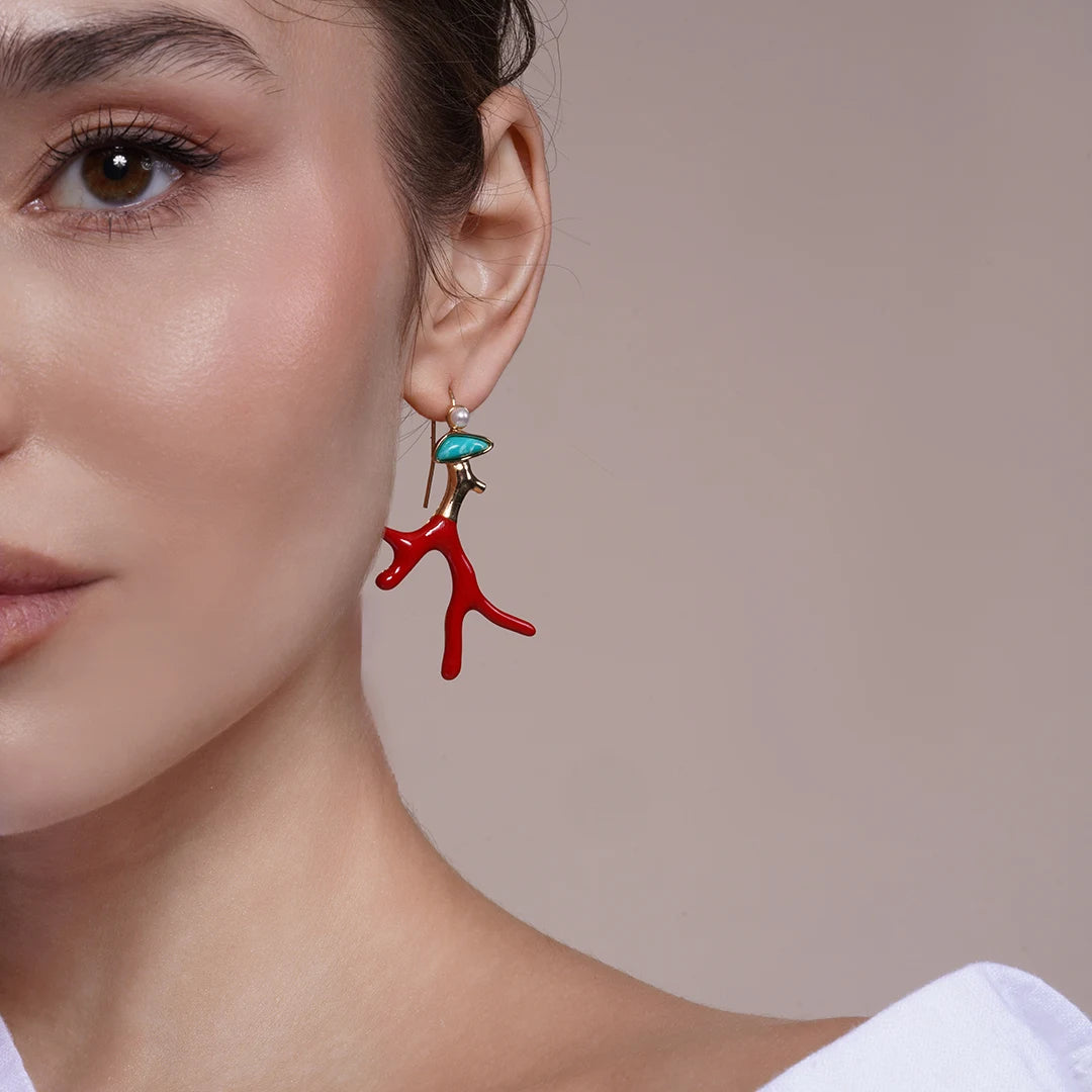 Model wearing Red Coral Enamel Drop Earrings in Pearl and Turquoise Stone Accent