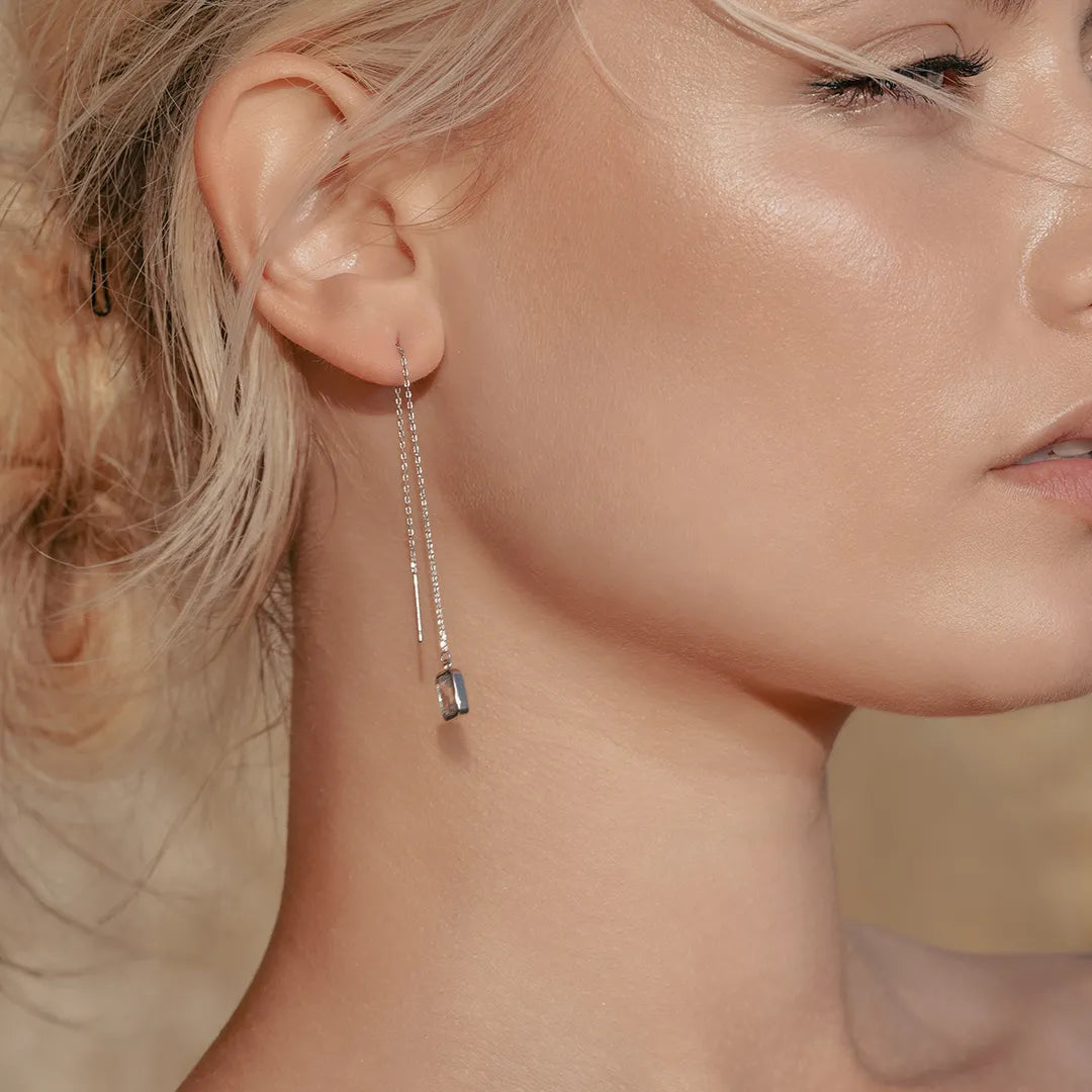 Model wearing Zard Jewelry Threader Earrings in Emerald-Cut Clear CZ
