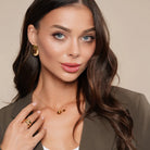 Model wearing Tiger Eye Crystal Chunky Stud Earrings in Gold, alternate pose
