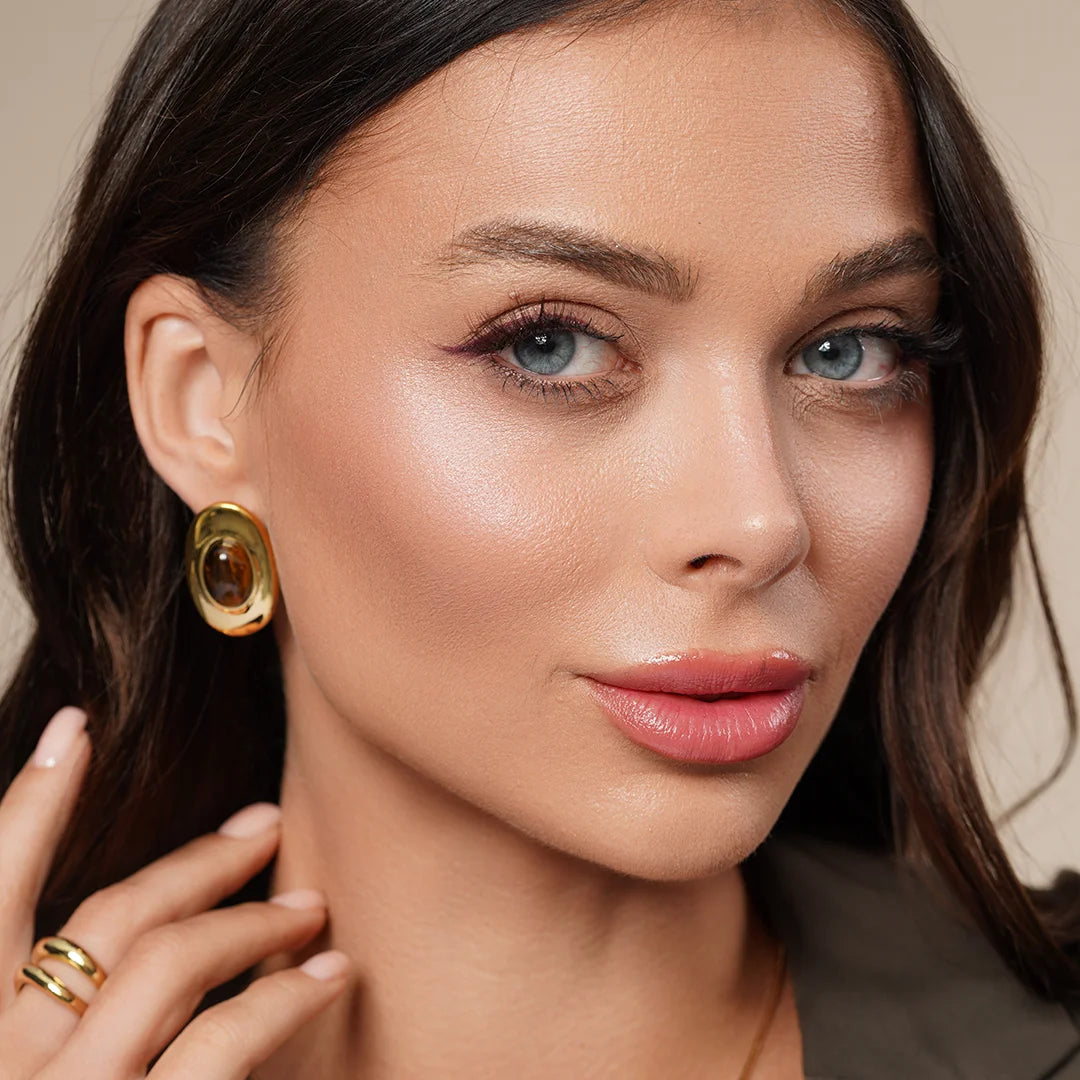 Model wearing Tiger Eye Crystal Chunky Stud Earrings in Gold, third styled look