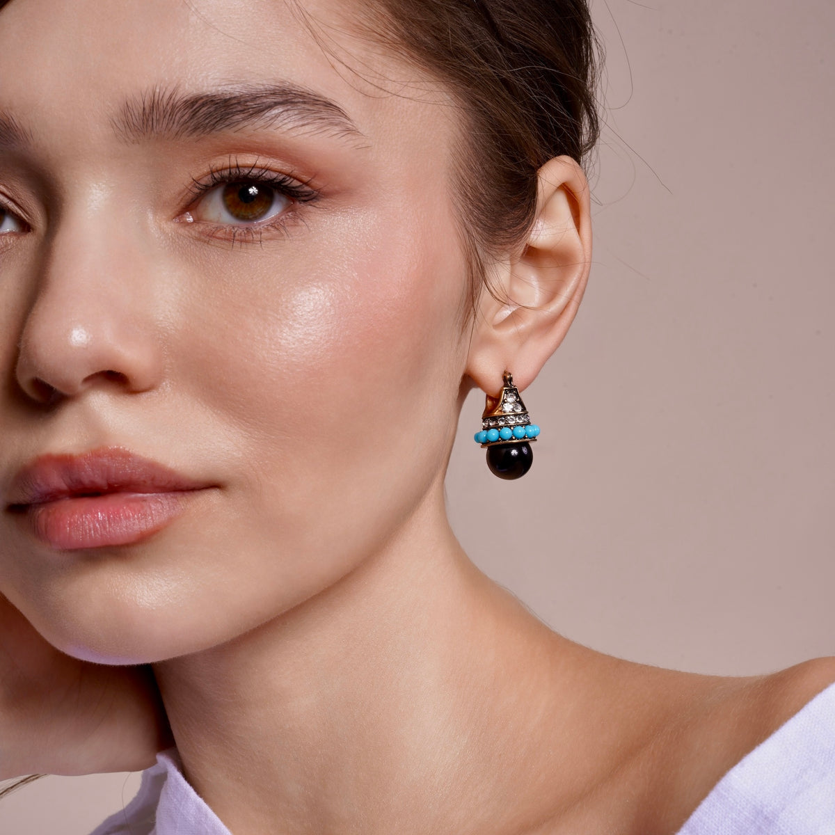 Model wearing Turquoise and Black Bead Crystal Classic Hook Earrings in 14K gold plate