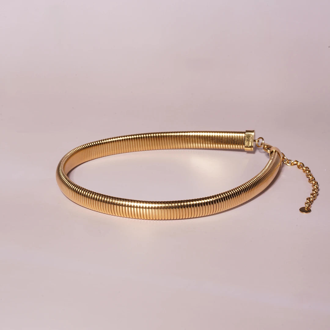 Omega Chain Chunky Choker Necklace in Gold and Silver, gold styled on a soft-toned background