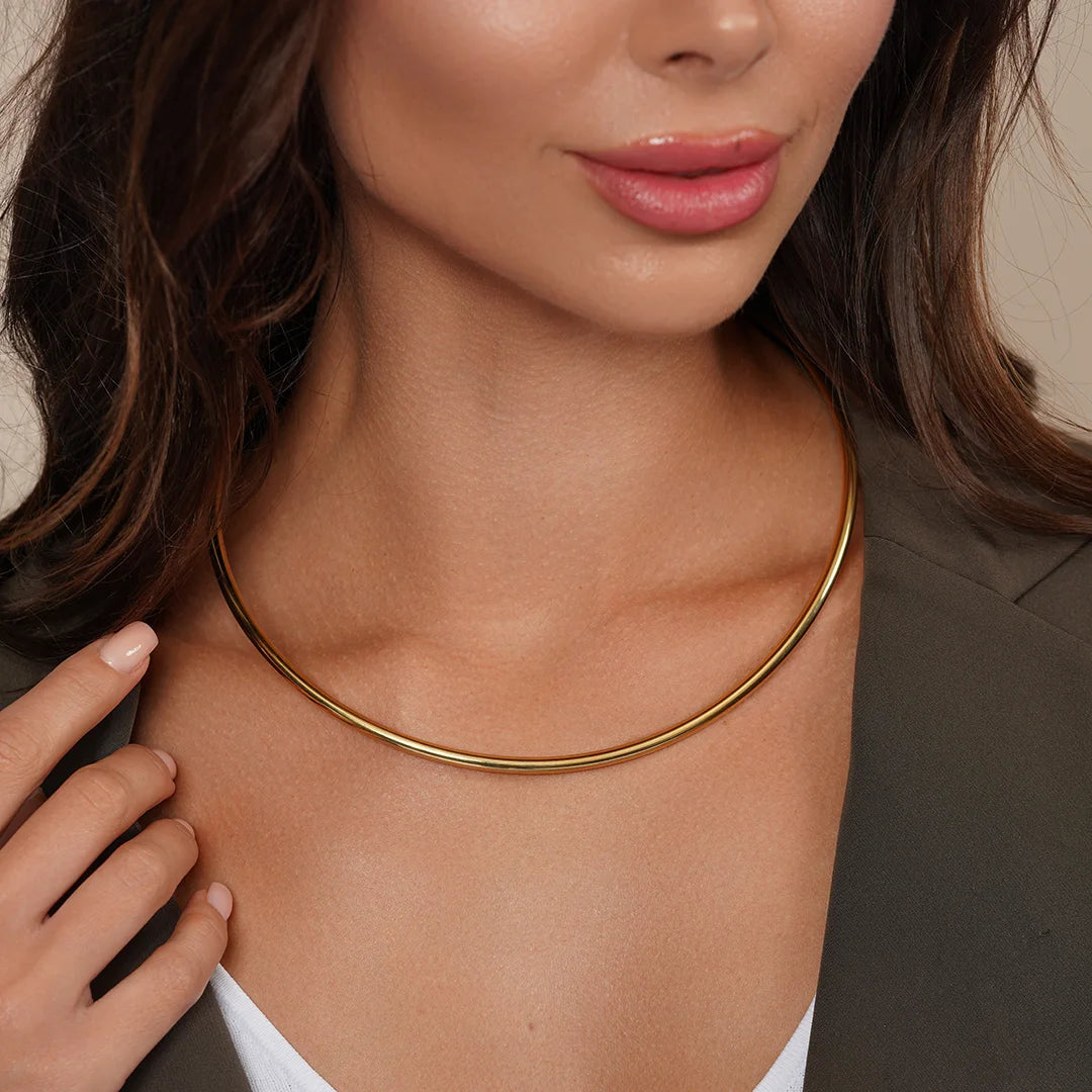 Model wearing Open Collar Solid Flat Choker Slider in Gold around her neck