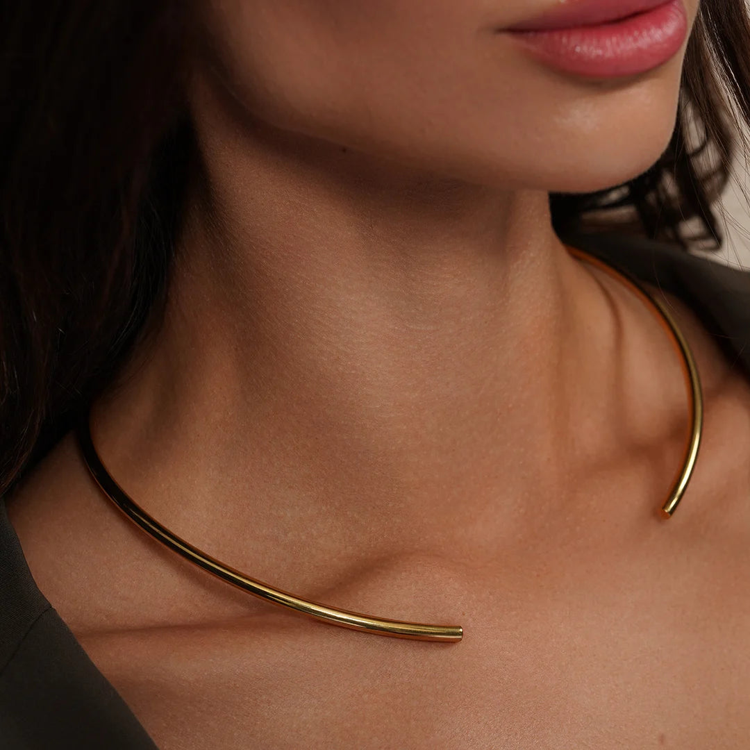 Model wearing Open Collar Solid Flat Choker Slider in Gold around her neck, alternate pose