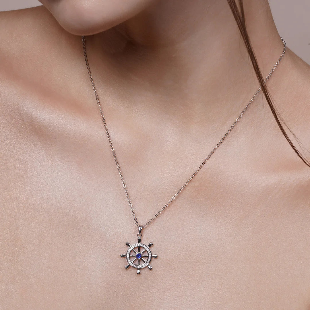 Model wearing Ship-Wheel Pendant Necklace around her neck