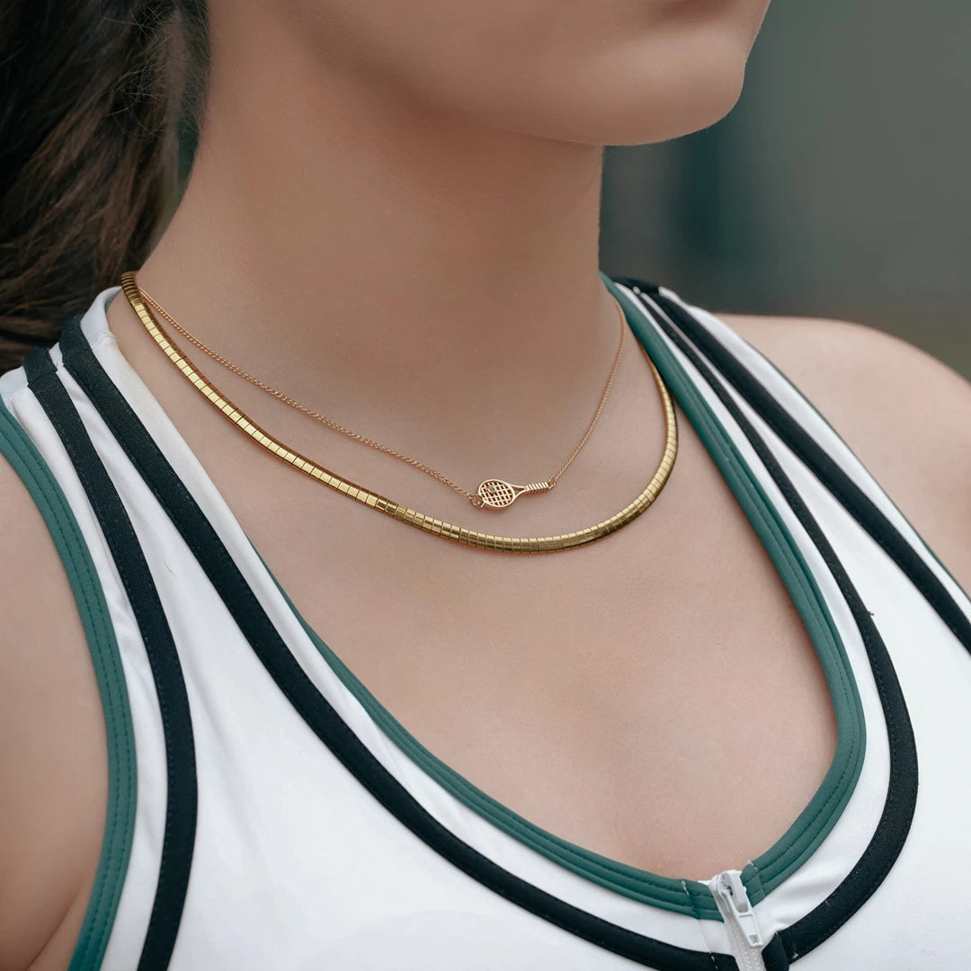 Model wearing Tennis Racket Charm Necklace around her neck