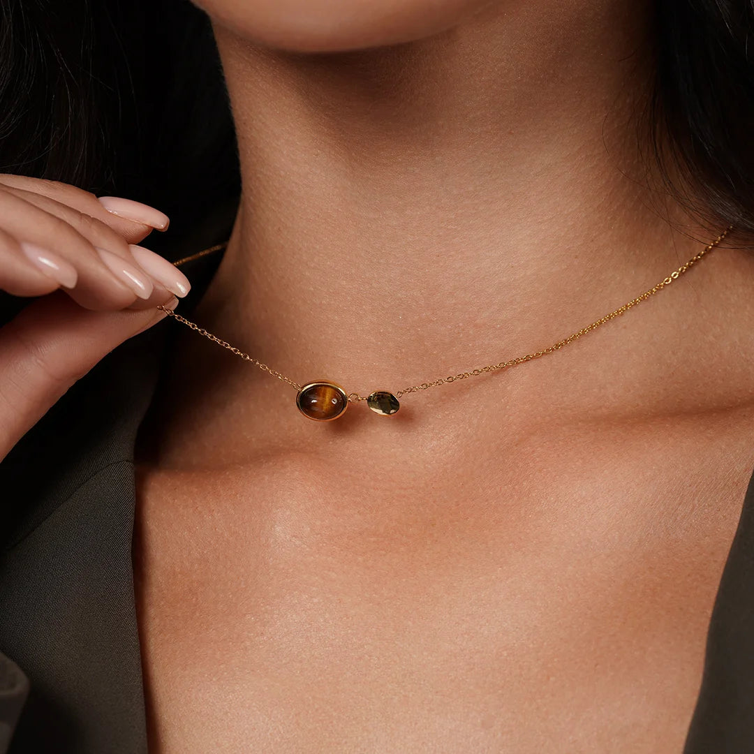 Model wearing Tiger Eye Pendant Necklace in 18K Gold around her neck