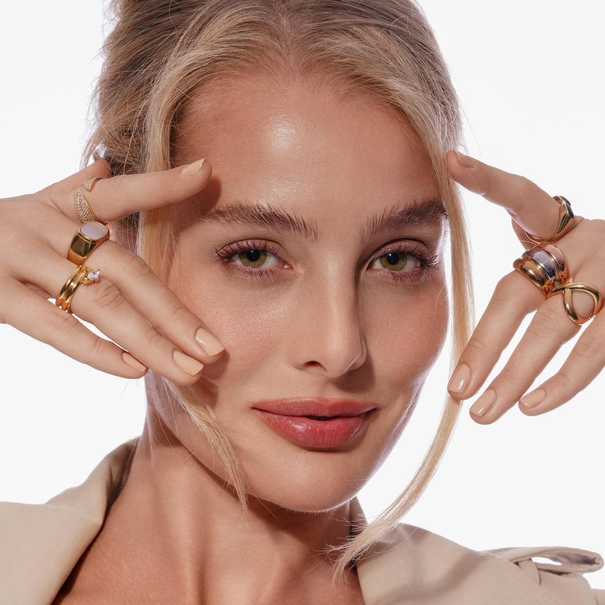Gold Crisscross Statement Ring worn on a model's hand, close-up