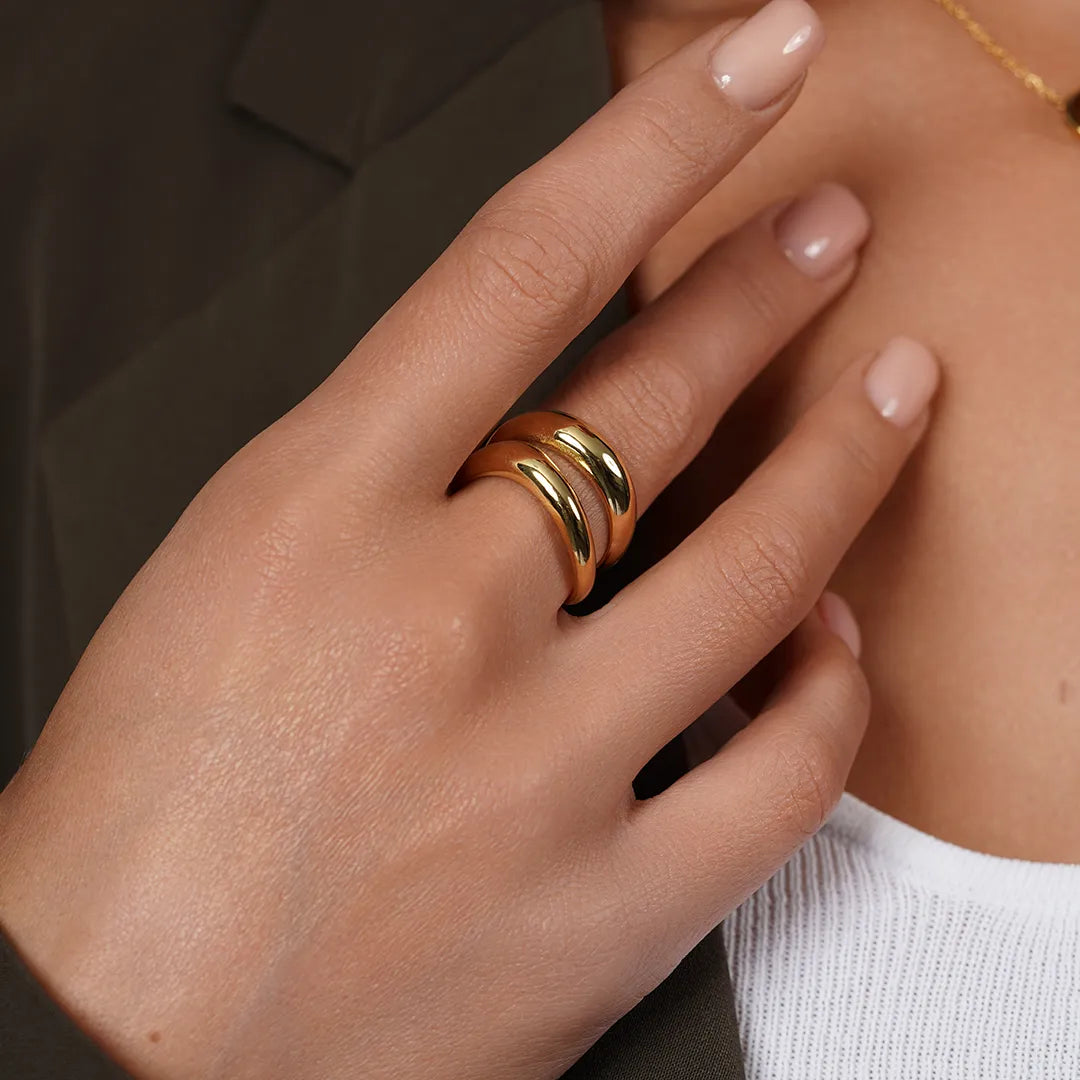 Gold Double Row Minimalist Ring worn on a model's hand
