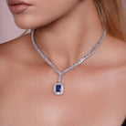 Model wearing Blue CZ Statement Tennis Necklace and Earrings Set
